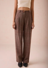 A Model Wearing Brown Handwoven Cotton The Hazel Sun Handspun Handwoven Organic Cotton Trousers, curated by Only Ethikal